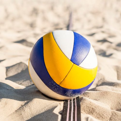 close-up-volleyball-beach-sand_23-2148662652